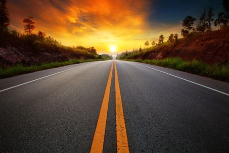 view of an open road during sunset